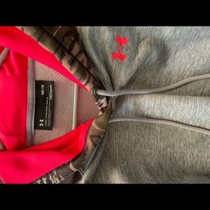 Under Armor Sweat shirt(hooded); gray with a pink emblem;camo arms and camo hood